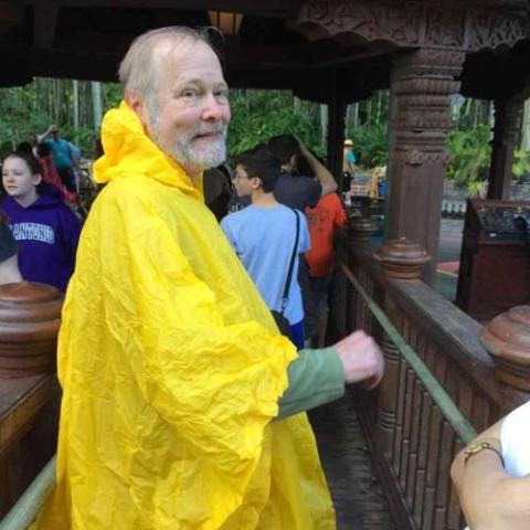 Tom Behrens wearing a raincoat